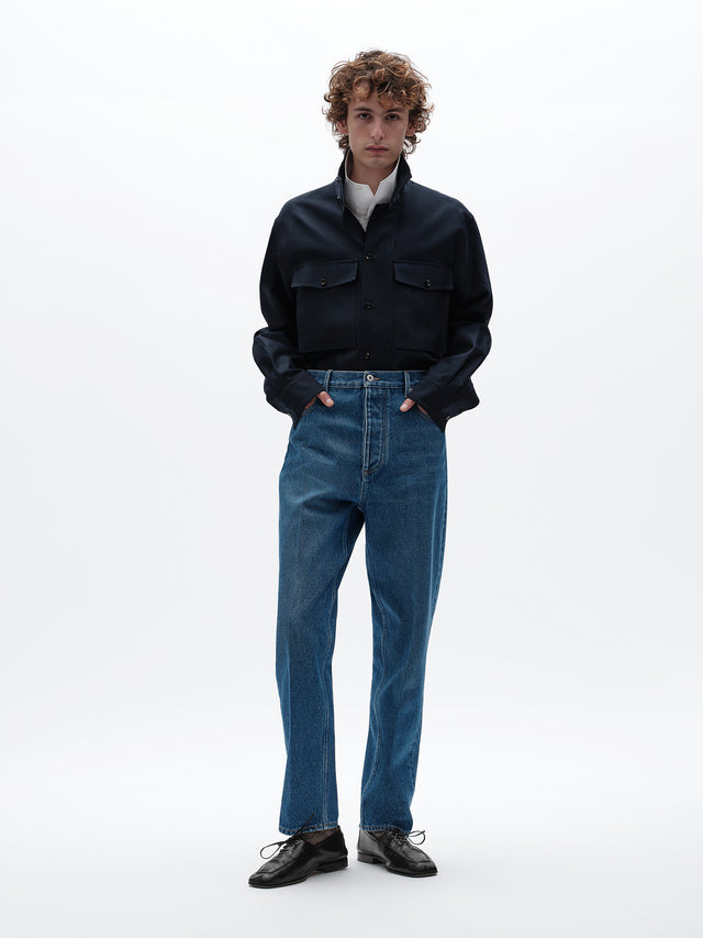 Jeans a gamba ampia con lavaggio medio indaco