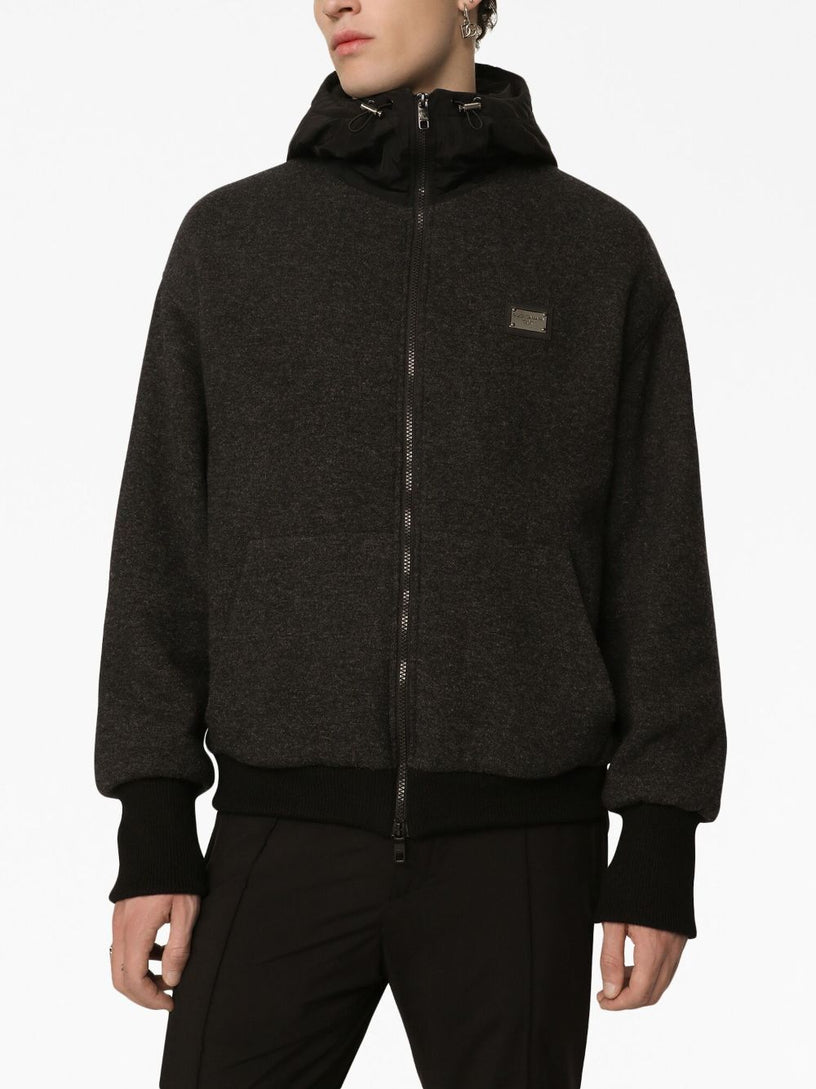 Jacket with logo plaque