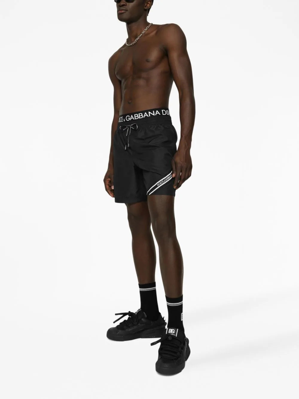 Mid-length swim trunks with branded band