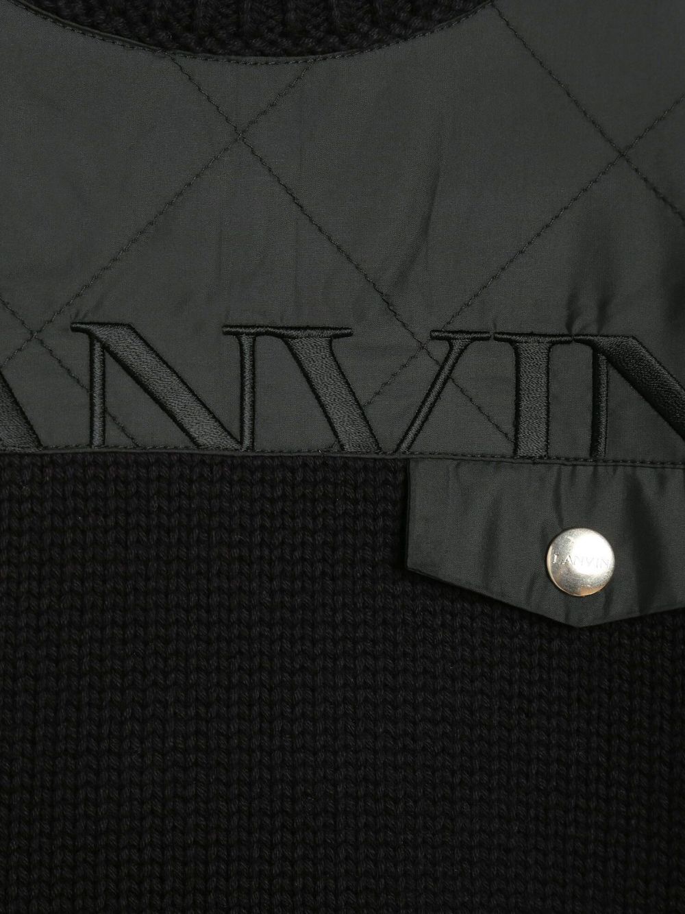 Bi-material jumper with pocket