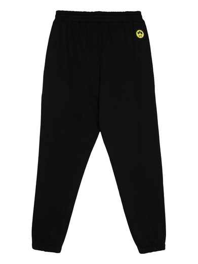 Sports trousers with rubberized logo