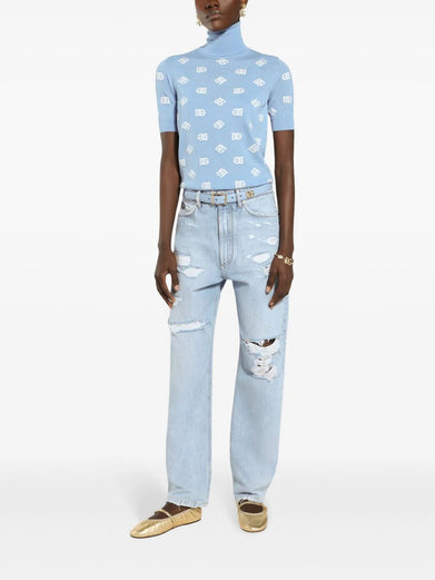 Distressed finish straight-legged jeans
