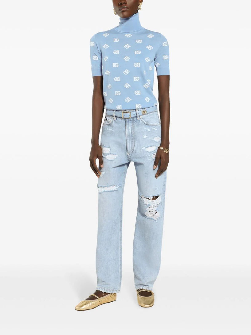 Distressed finish straight-legged jeans