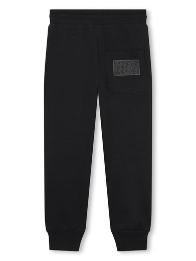 Sports trousers with rubberized logo
