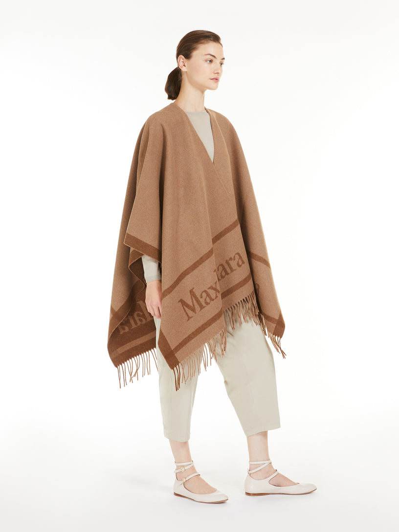 Hilde wool poncho with jacquard logo
