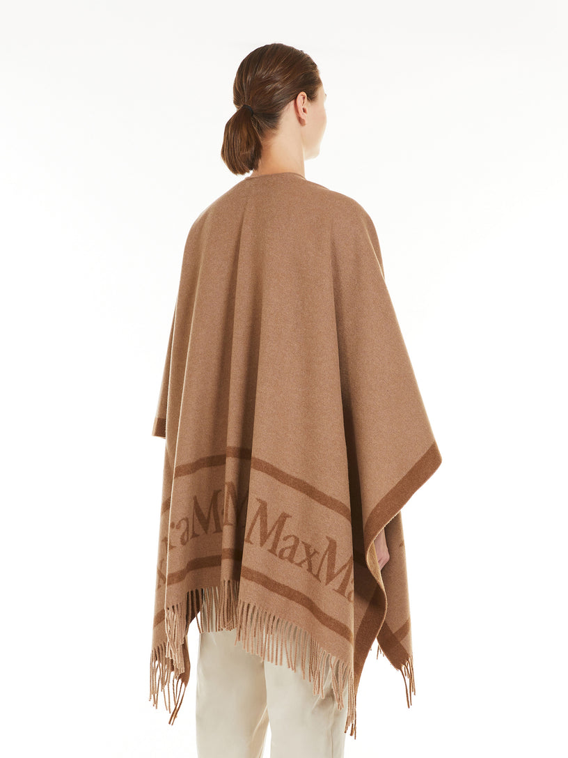 Hilde wool poncho with jacquard logo
