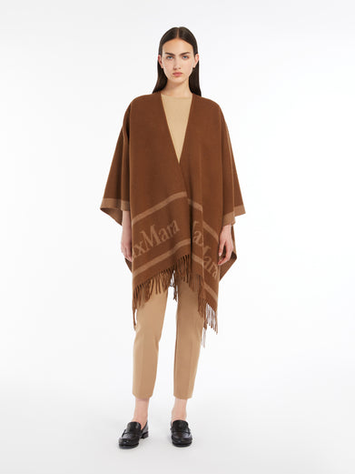 Hilde wool poncho with jacquard logo