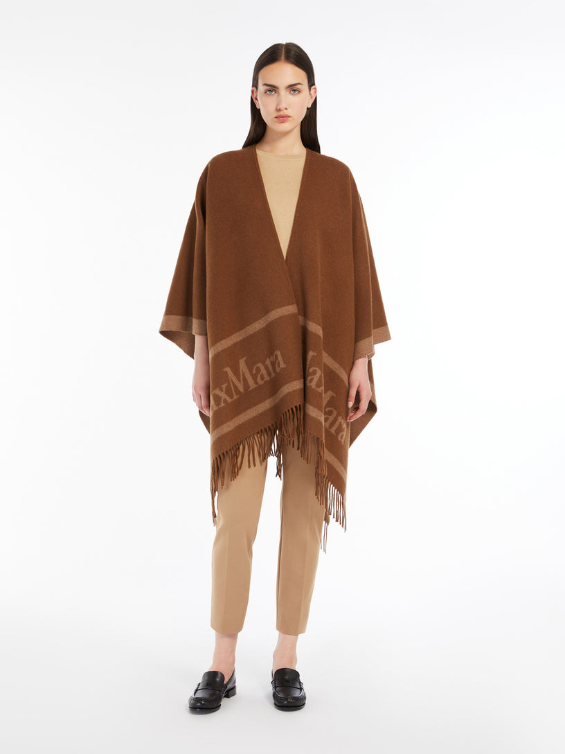 Hilde wool poncho with jacquard logo