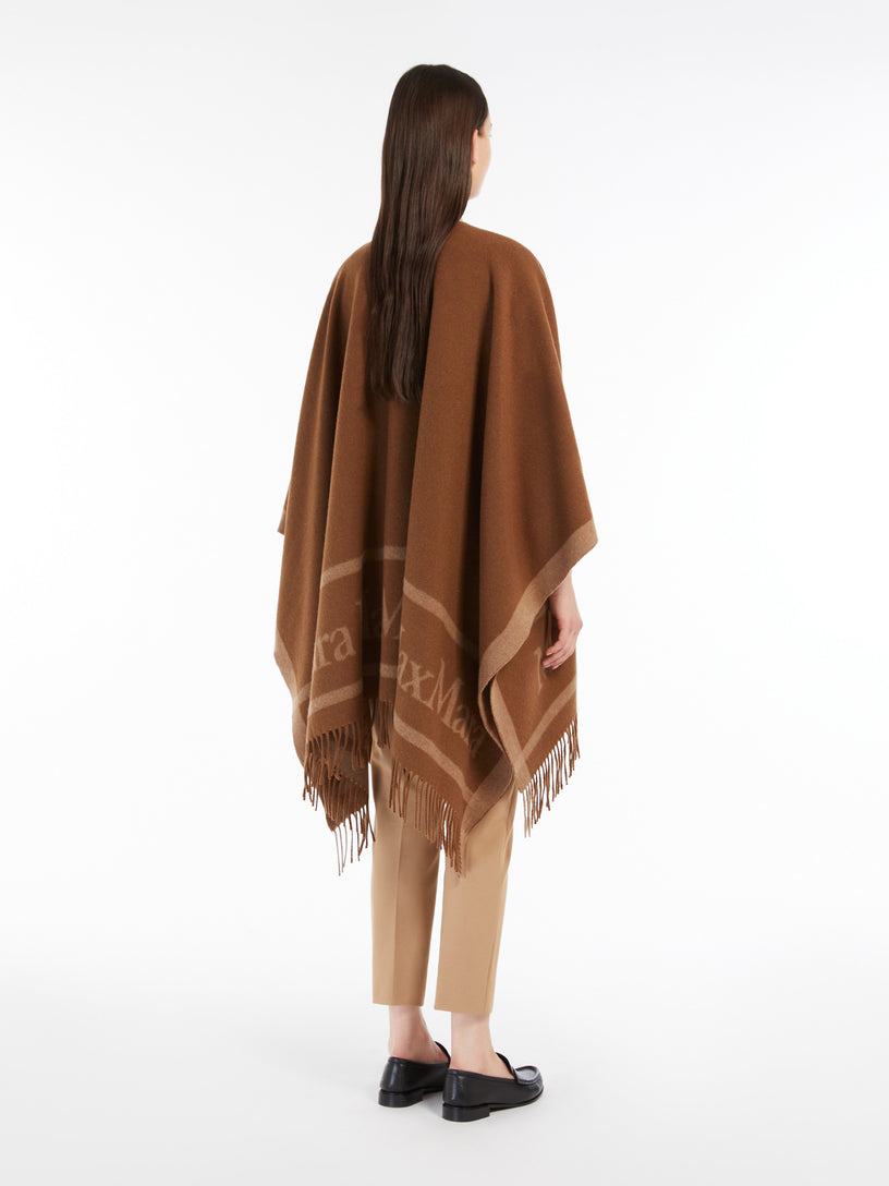 Hilde wool poncho with jacquard logo