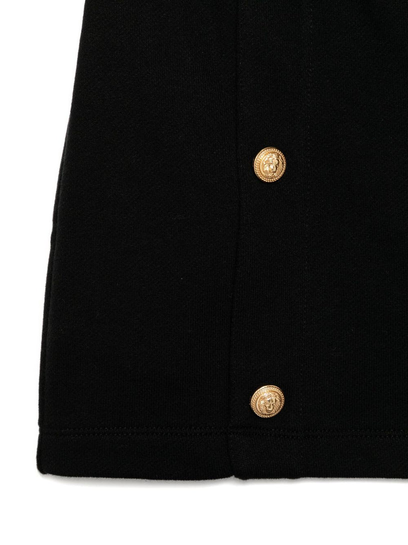 Skirt with gold buttons