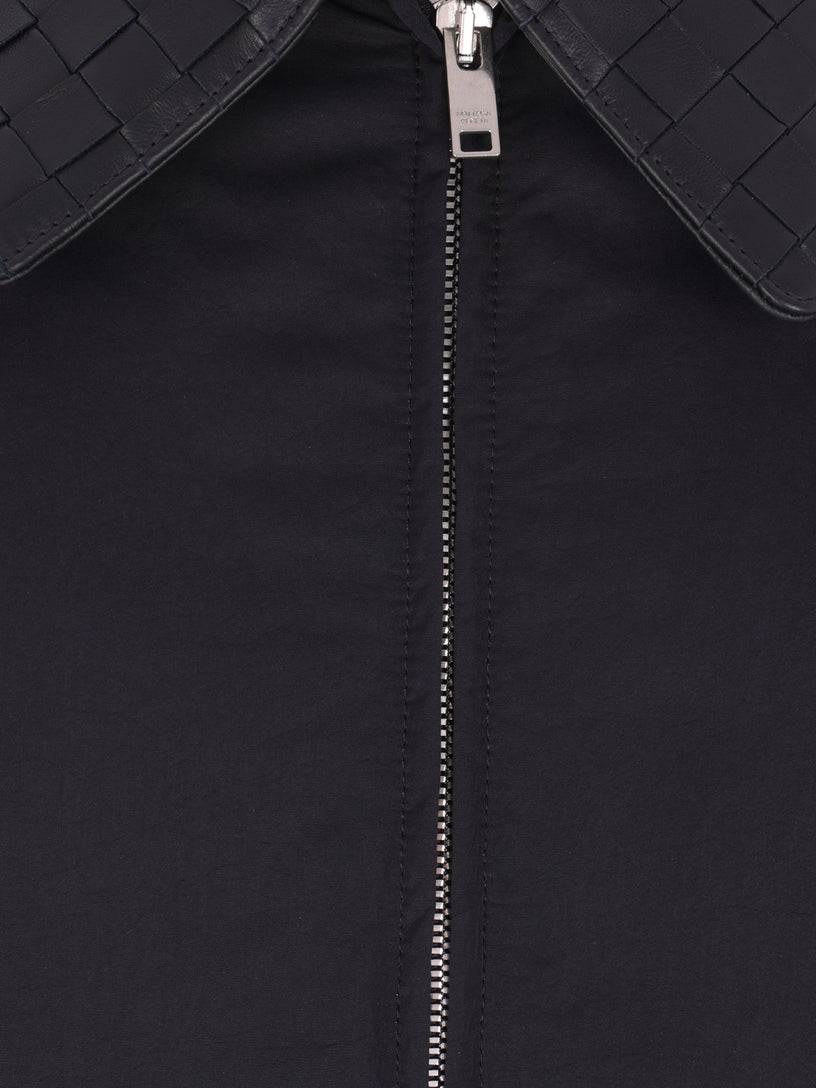 Down jacket with Intrecciato collar