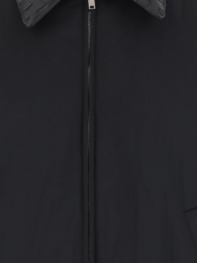 Down jacket with intrecciato collar