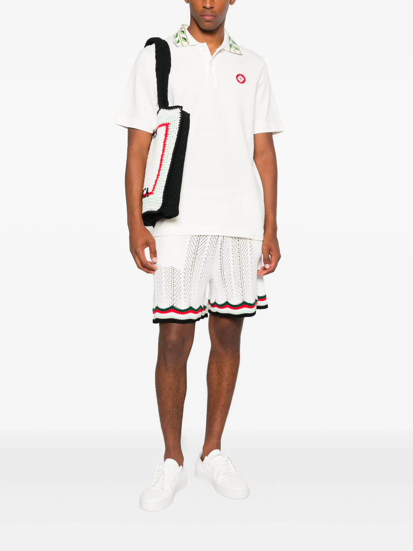 Short-sleeved polo shirt in laurel piqué