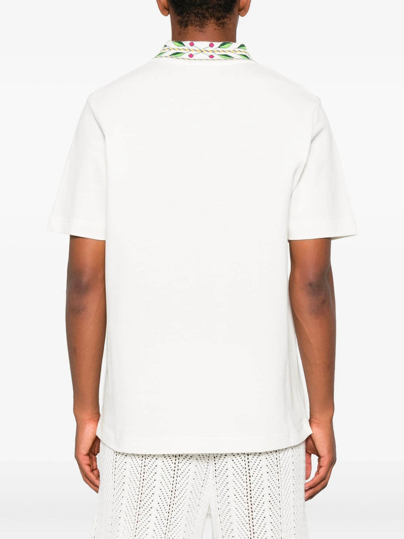 Short-sleeved polo shirt in laurel piqué