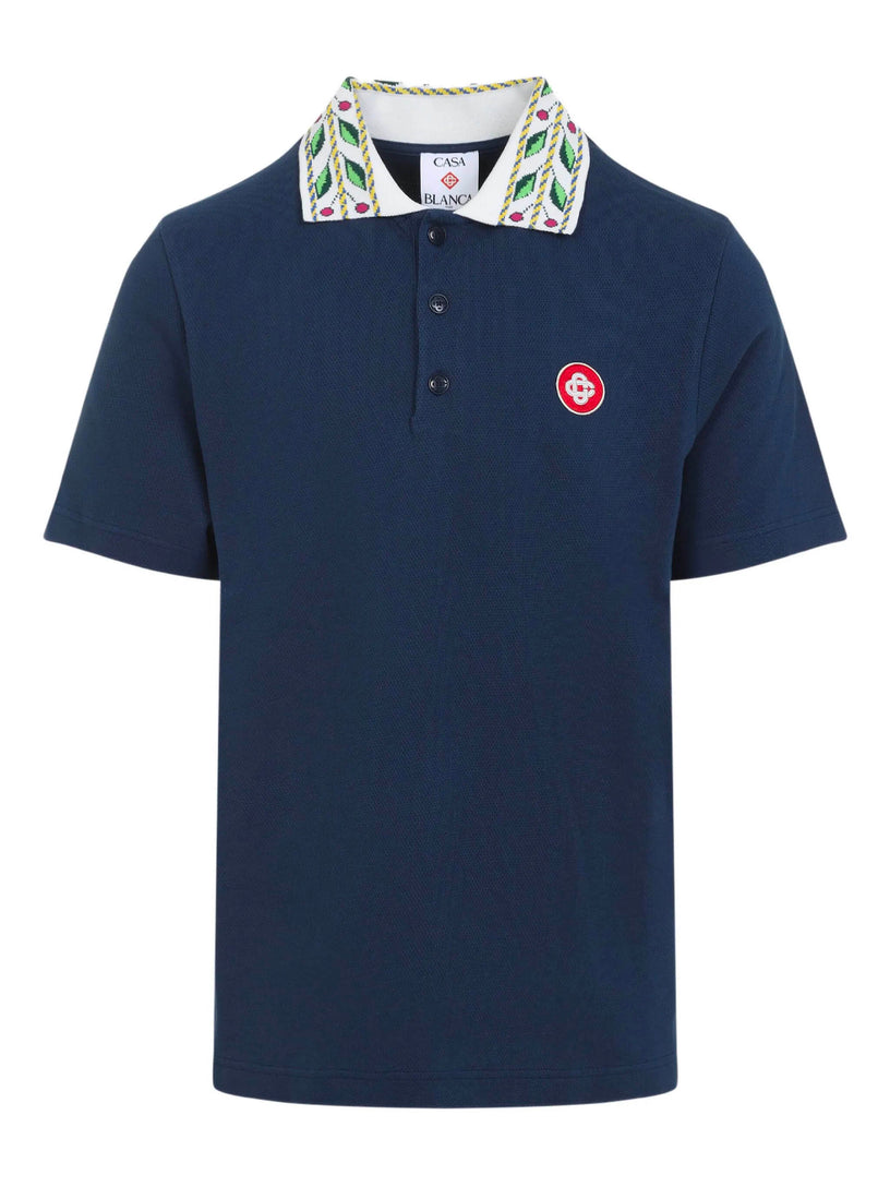 Short-sleeved polo shirt in laurel piqué