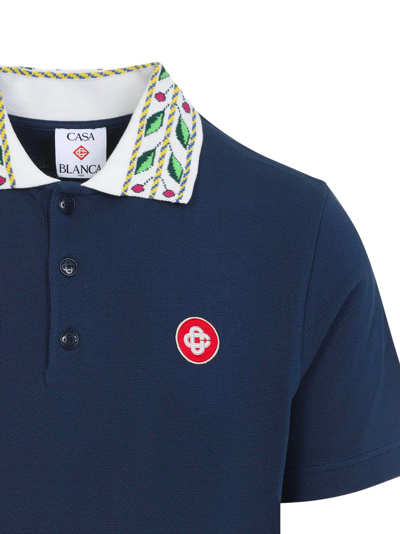 Short-sleeved polo shirt in laurel piqué