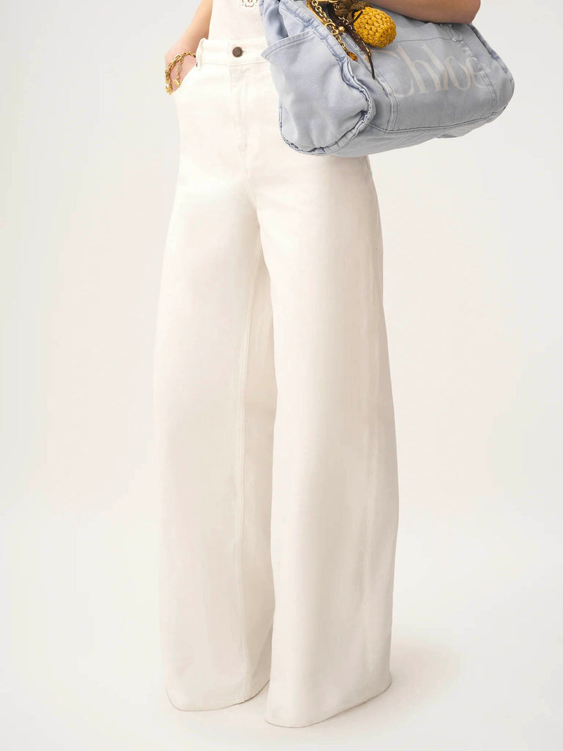 High-rise wide-leg jeans in denim