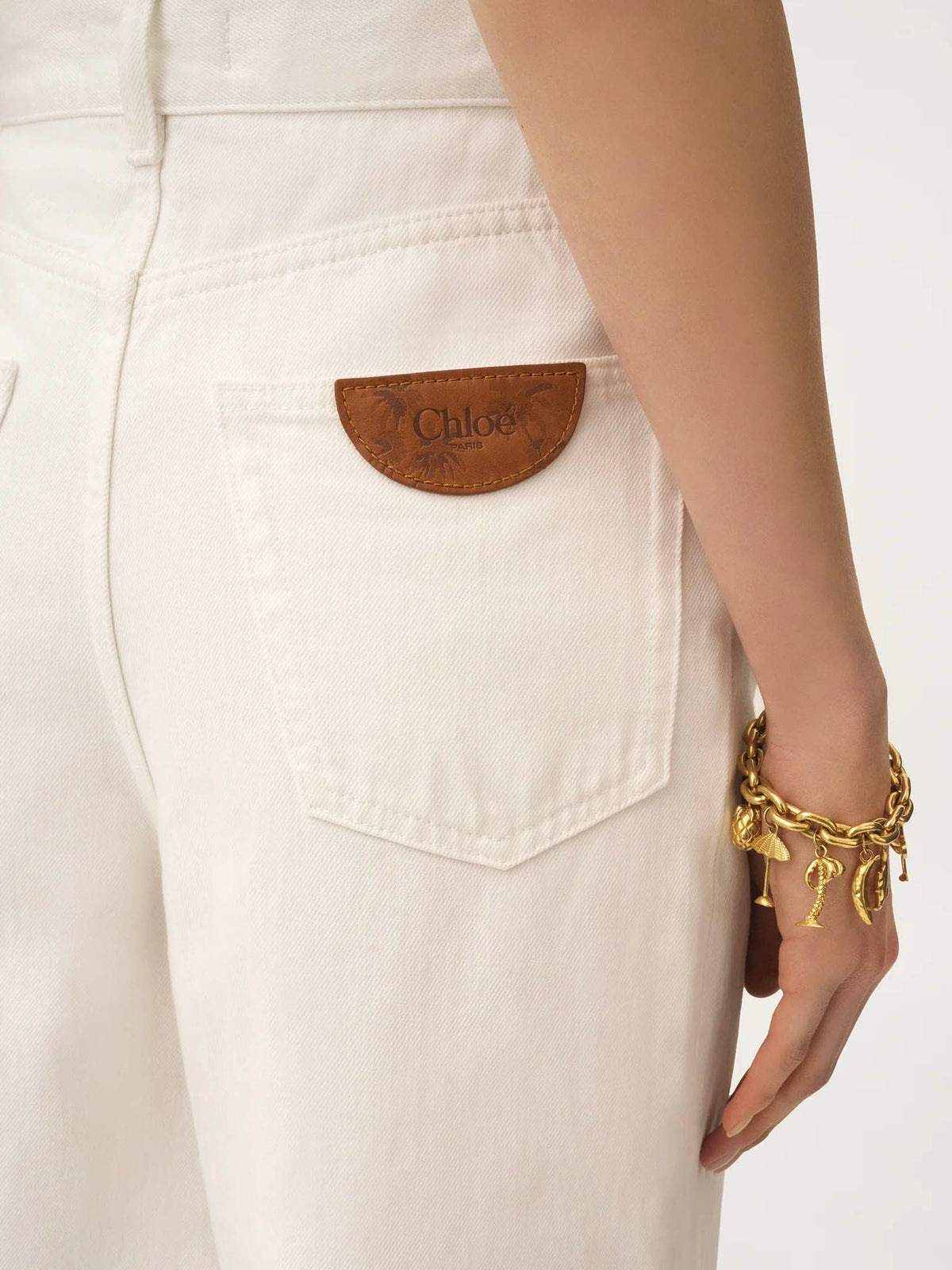 High-rise wide-leg jeans in denim