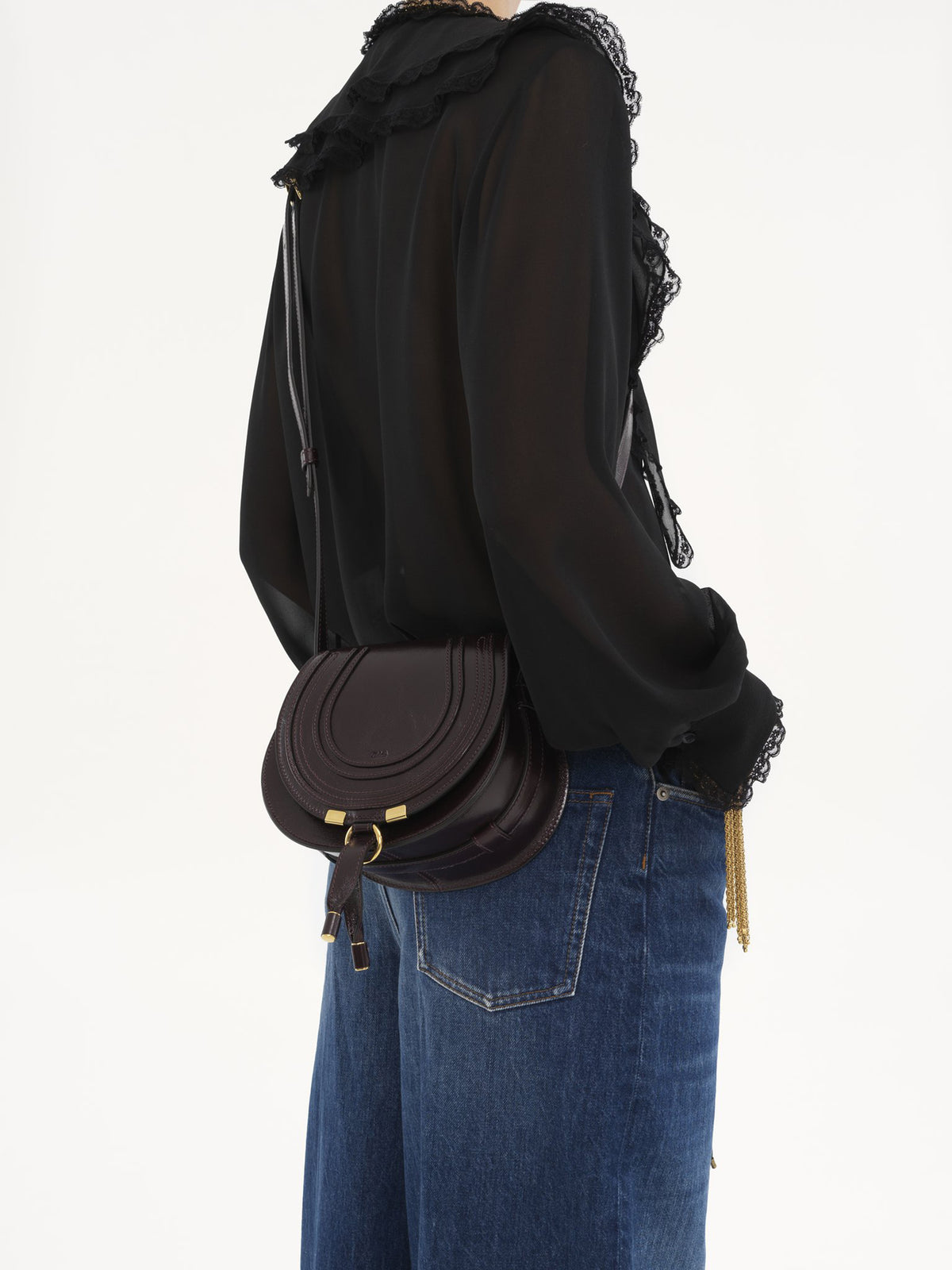 Marcie small saddle bag in shiny leather