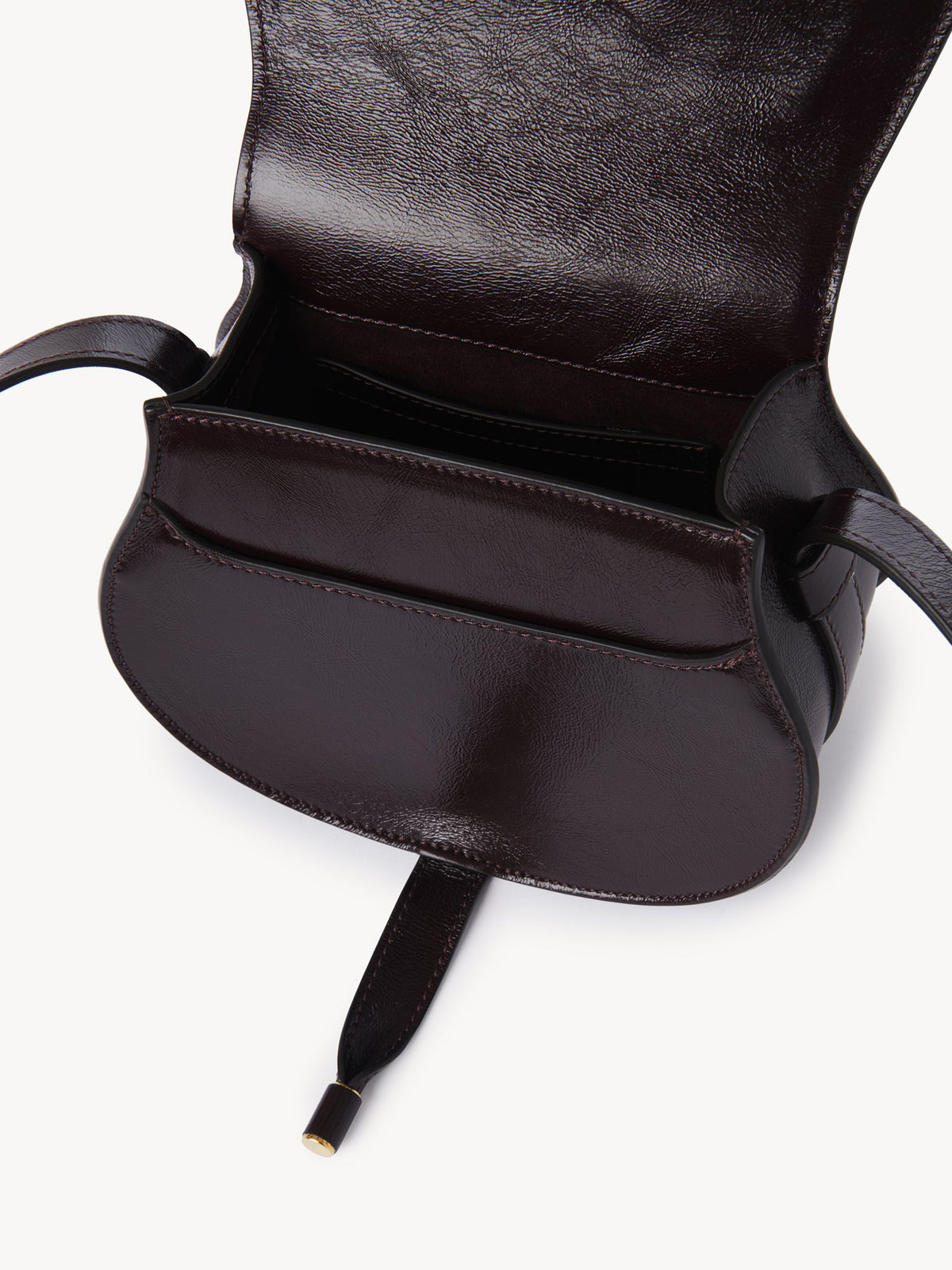 Marcie small saddle bag in shiny leather