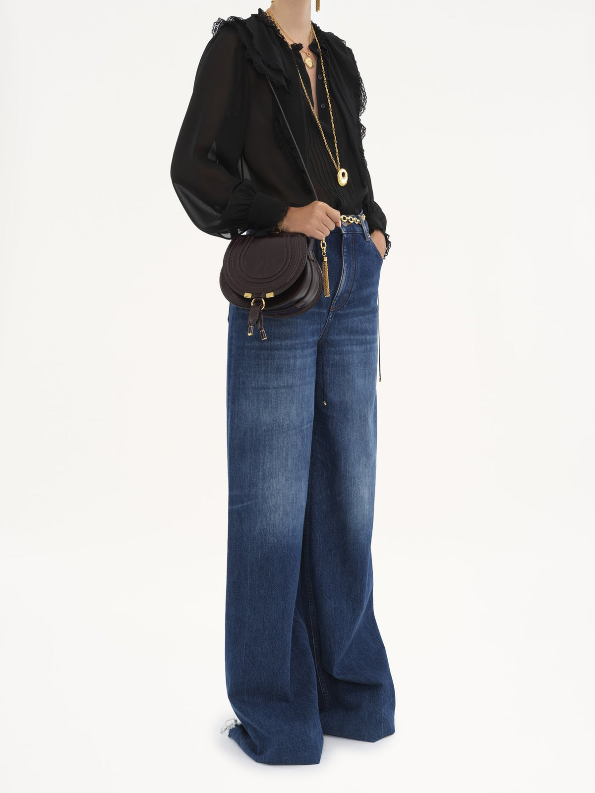 Marcie small saddle bag in shiny leather