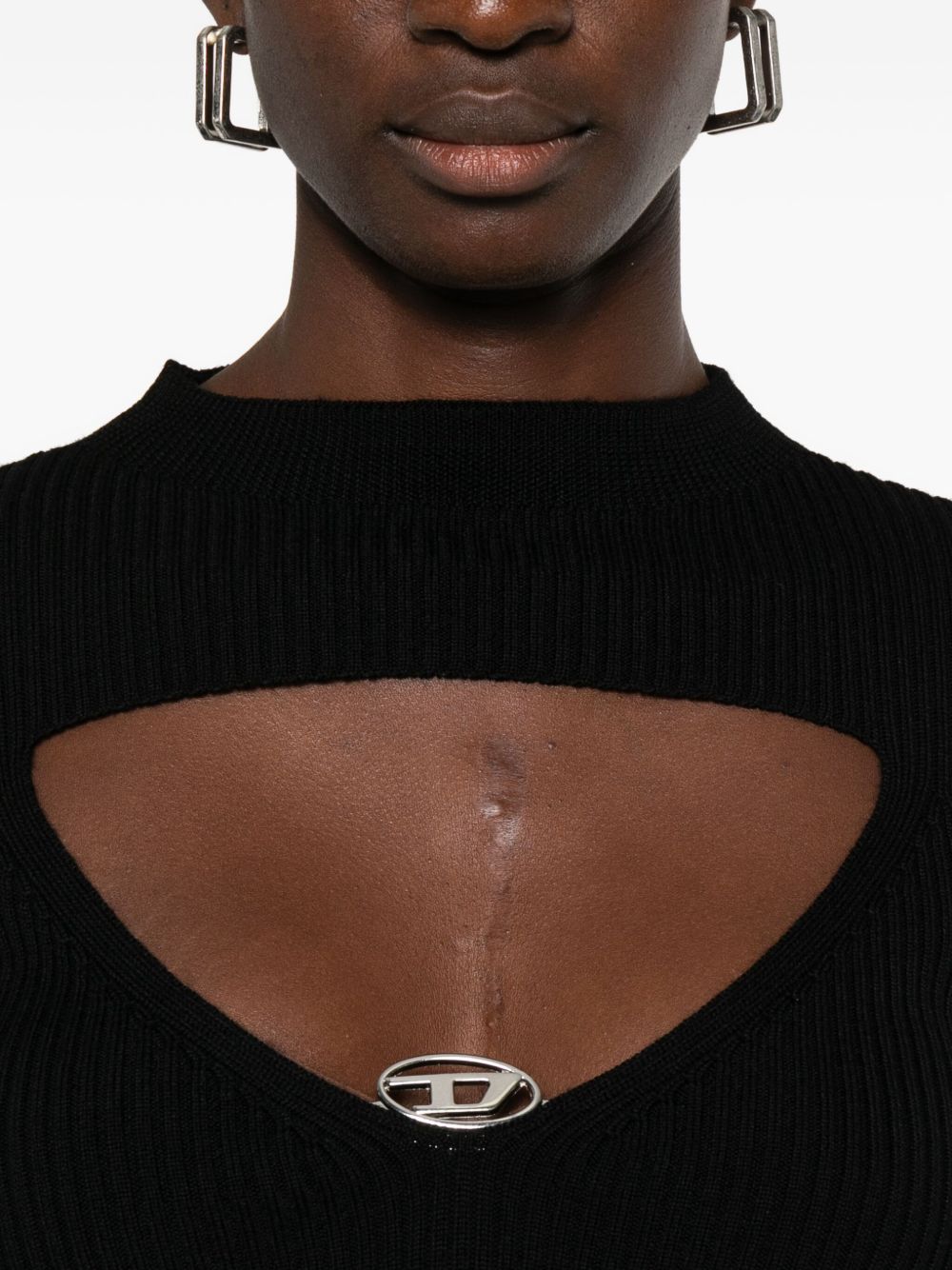 Top with drop opening
