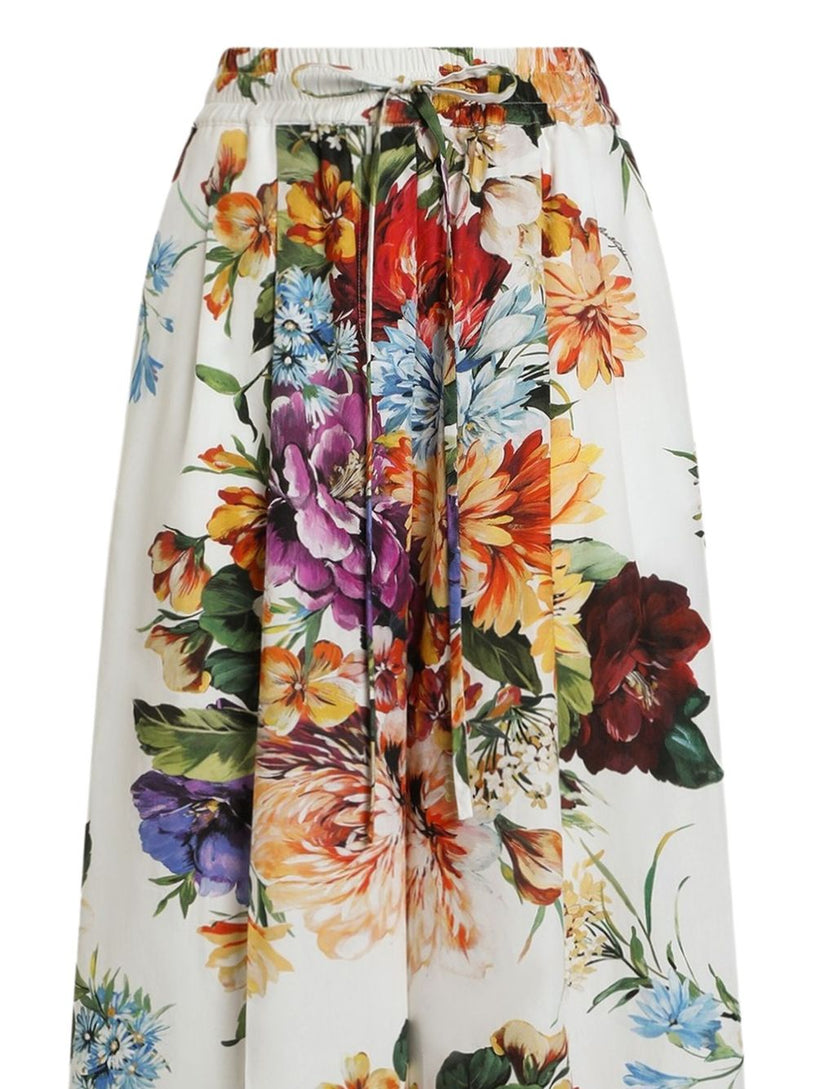 Poplin trousers with flower bouquet print