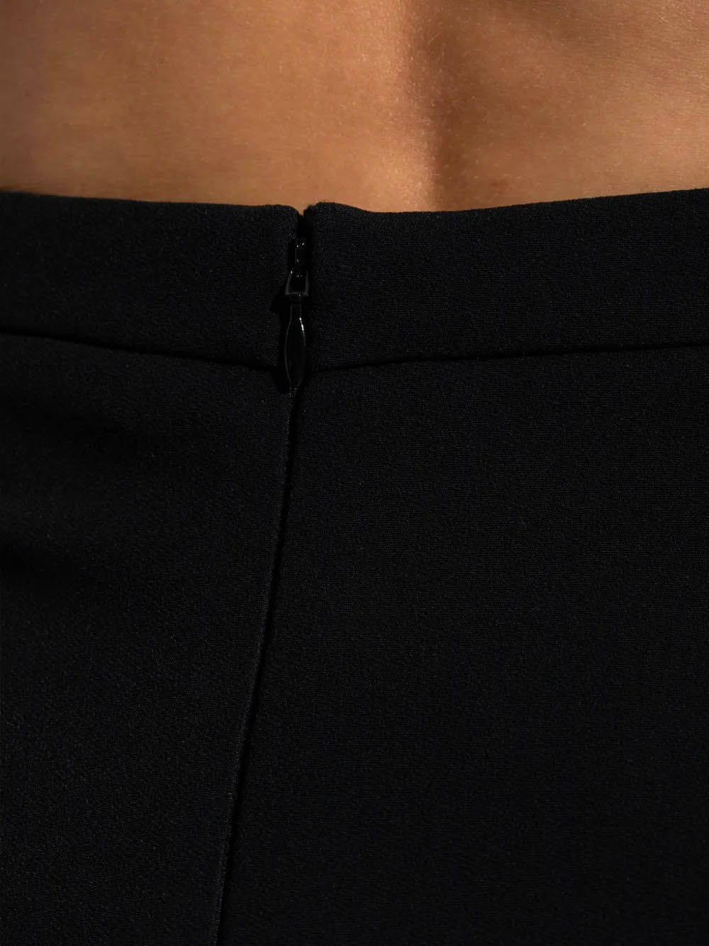 Midi skirt with pleats on the back