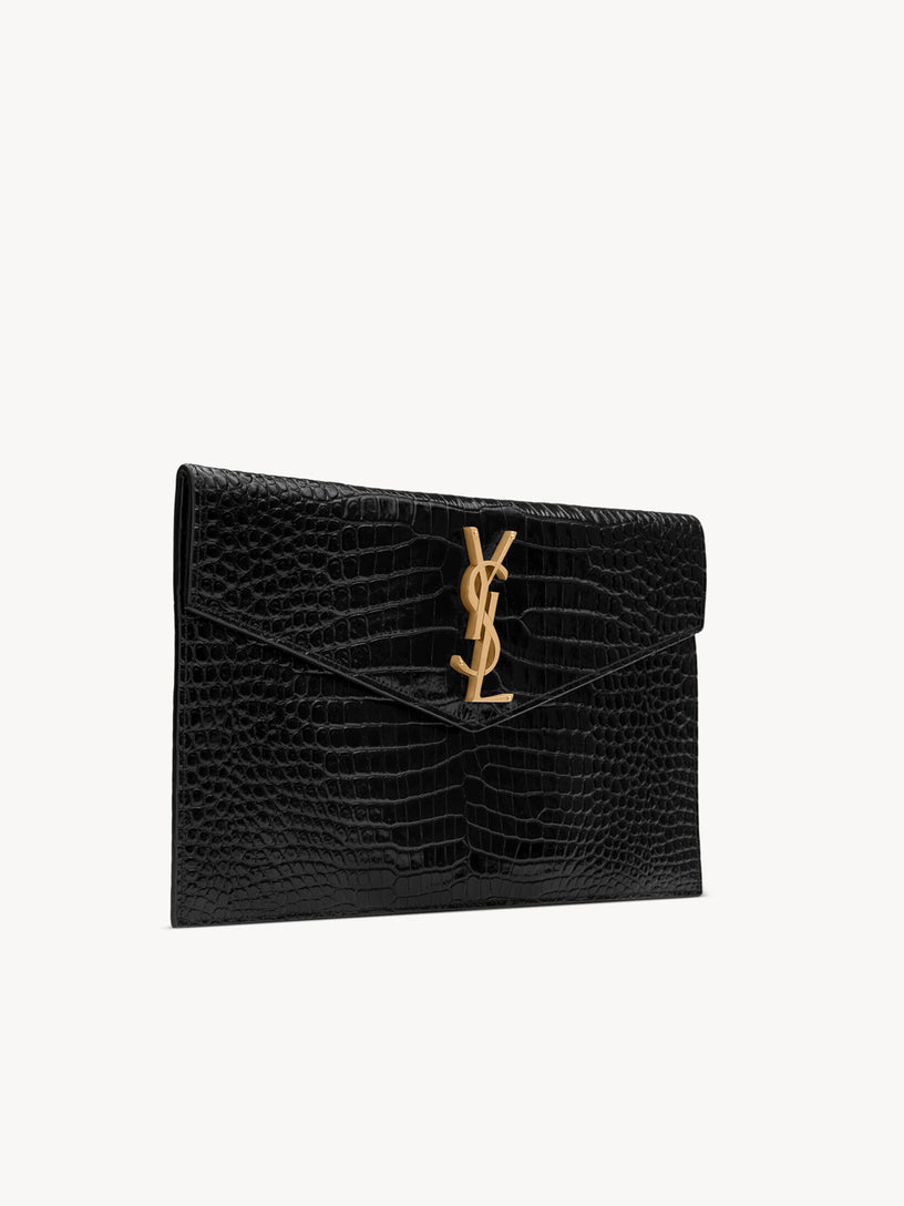 Uptown clutch bag in shiny crocodile embossed leather
