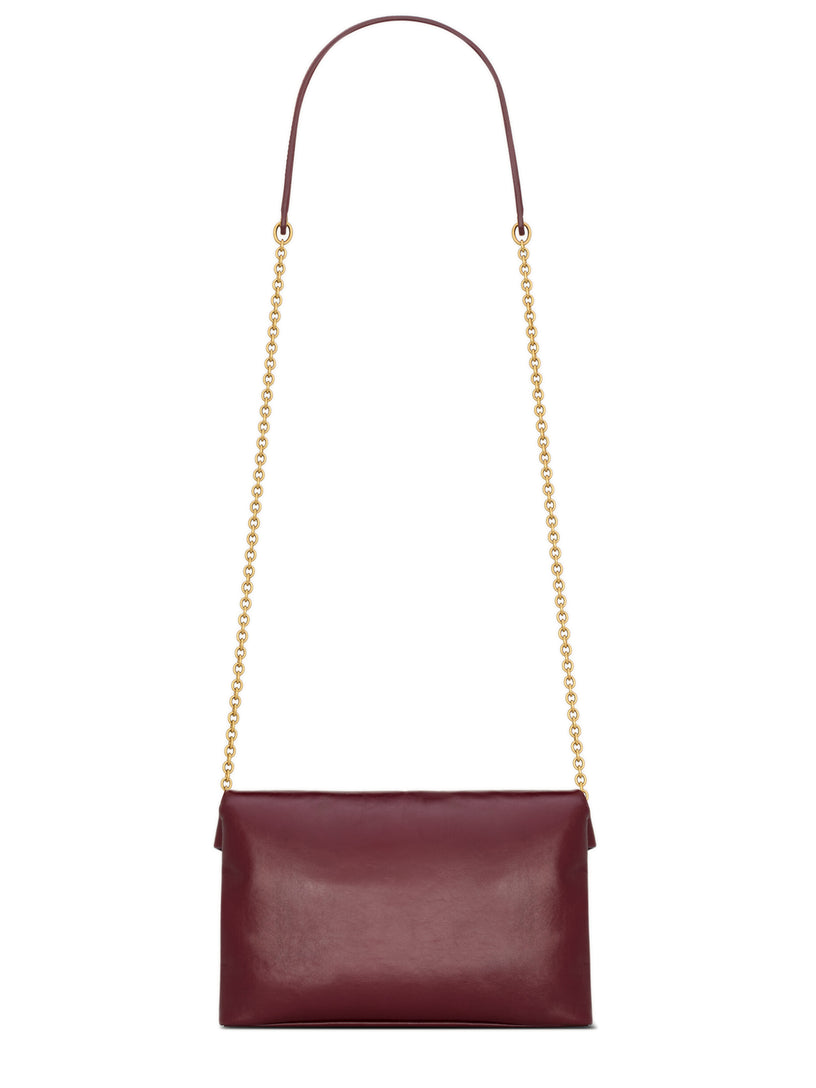 CASSANDRE chain pouch in shiny leather