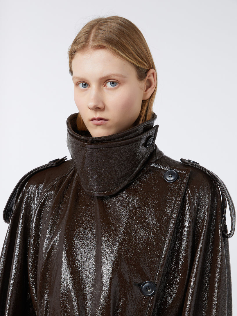 Long trench coat with patent leather effect