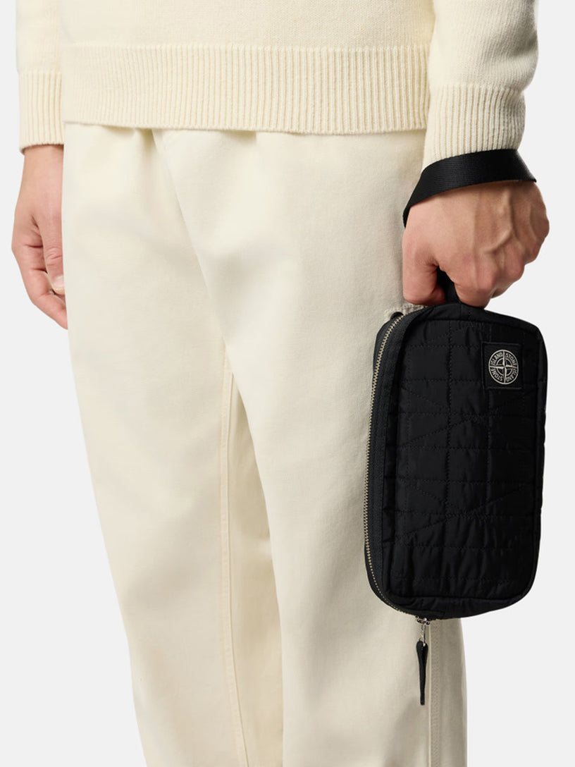 Wrist pouch with inner compartments and zip