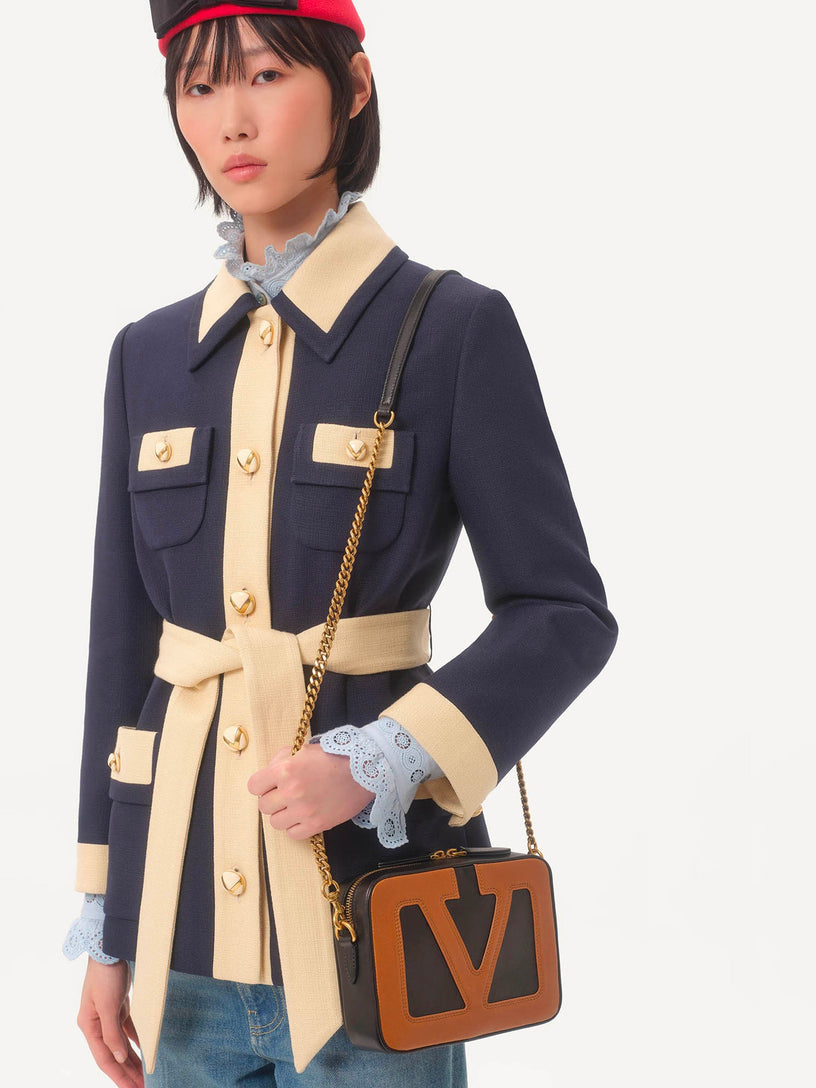 Single-breasted jacket with belt