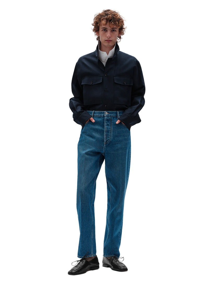 Jeans a gamba ampia con lavaggio medio indaco