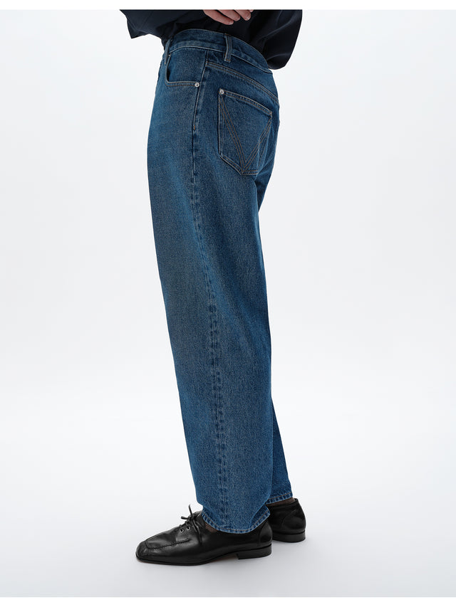 Jeans a gamba ampia con lavaggio medio indaco