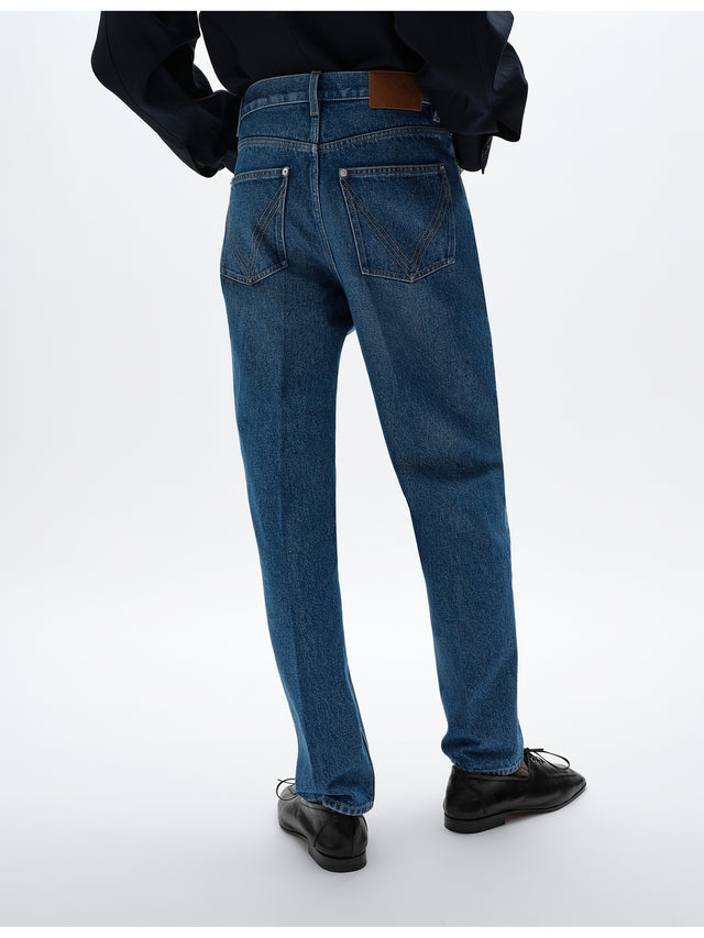 Jeans a gamba ampia con lavaggio medio indaco