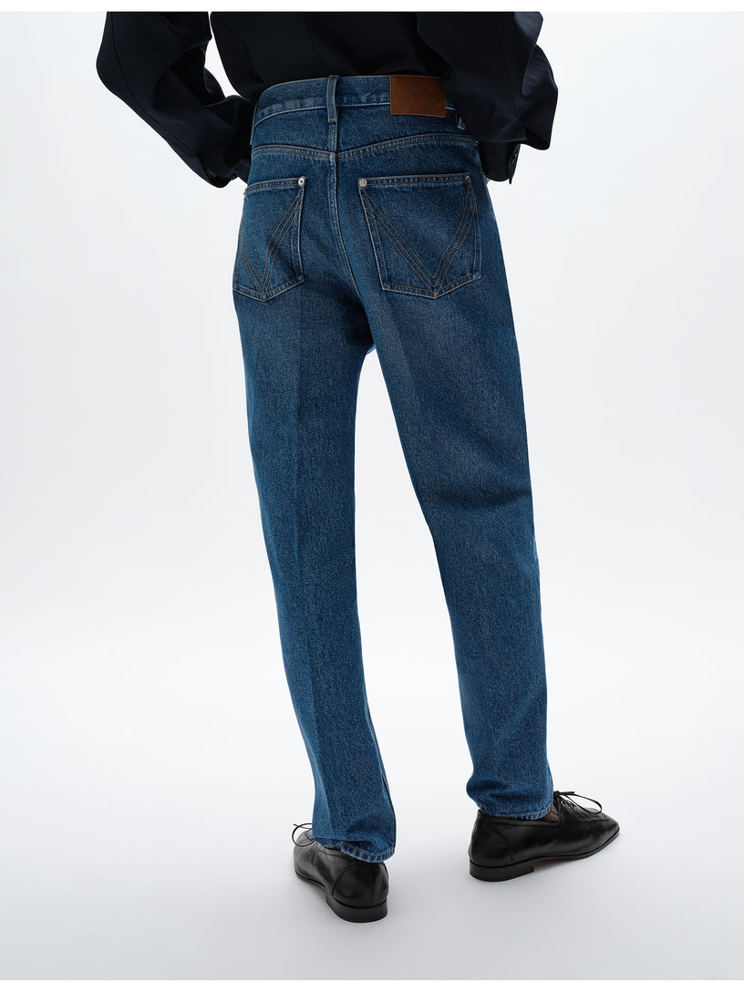 Jeans a gamba ampia con lavaggio medio indaco