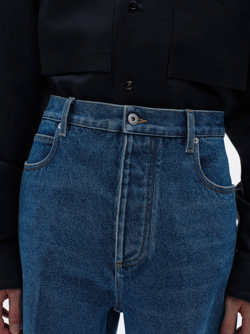 Jeans a gamba ampia con lavaggio medio indaco