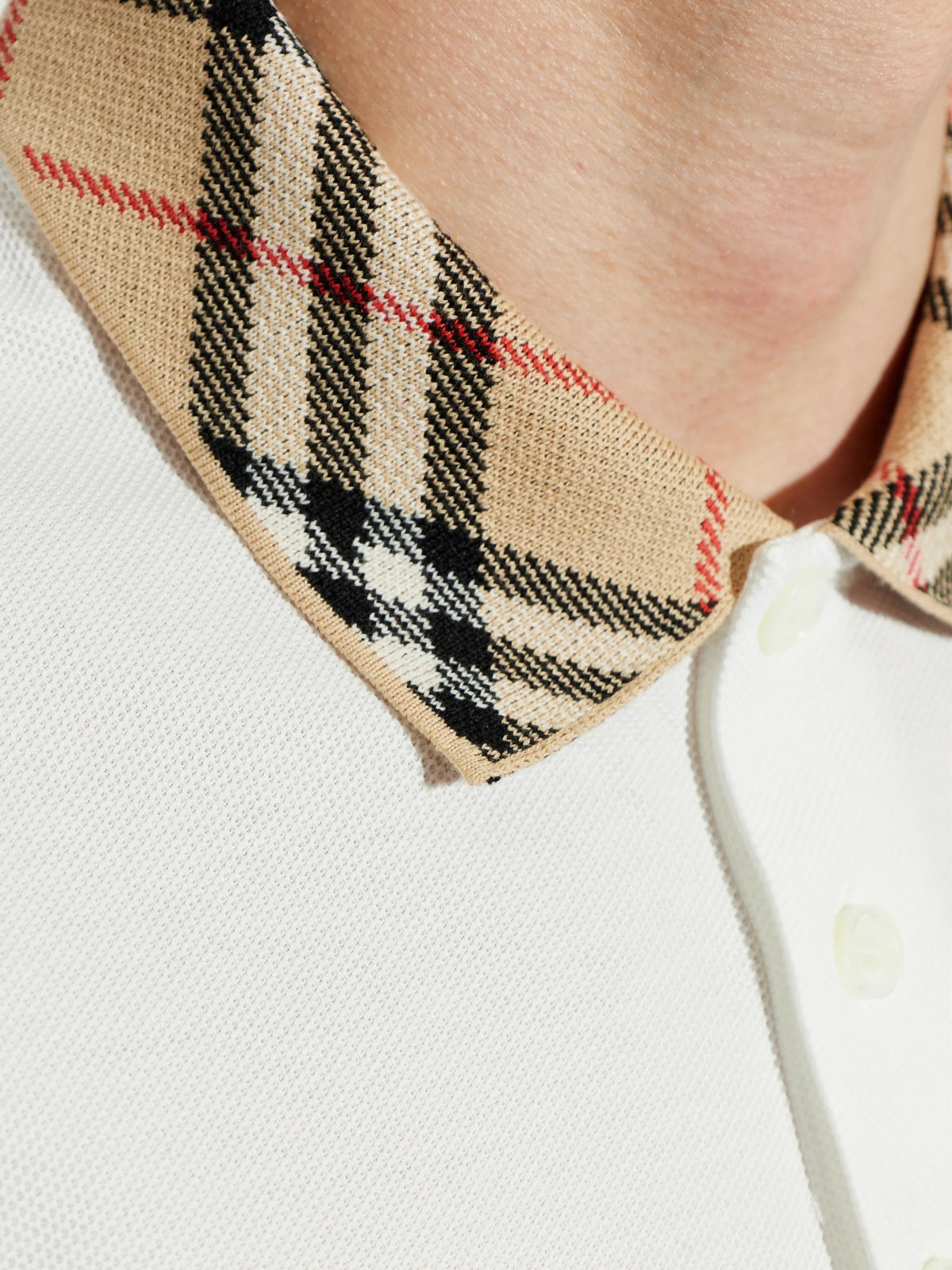 Polo con colletto check