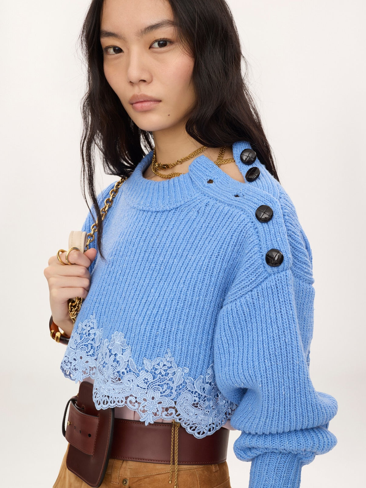 Pullover corto con pizzo