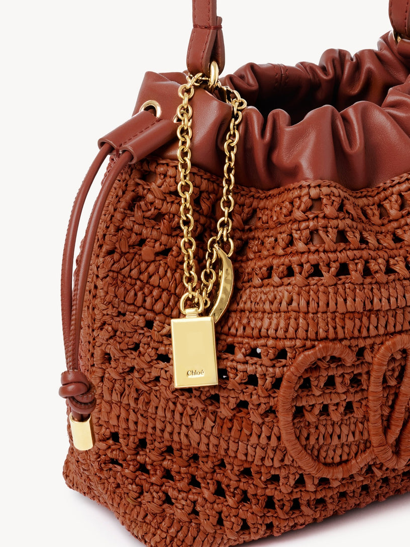 Mini borsa a tracolla estiva a forma di banana con coulisse in rafia