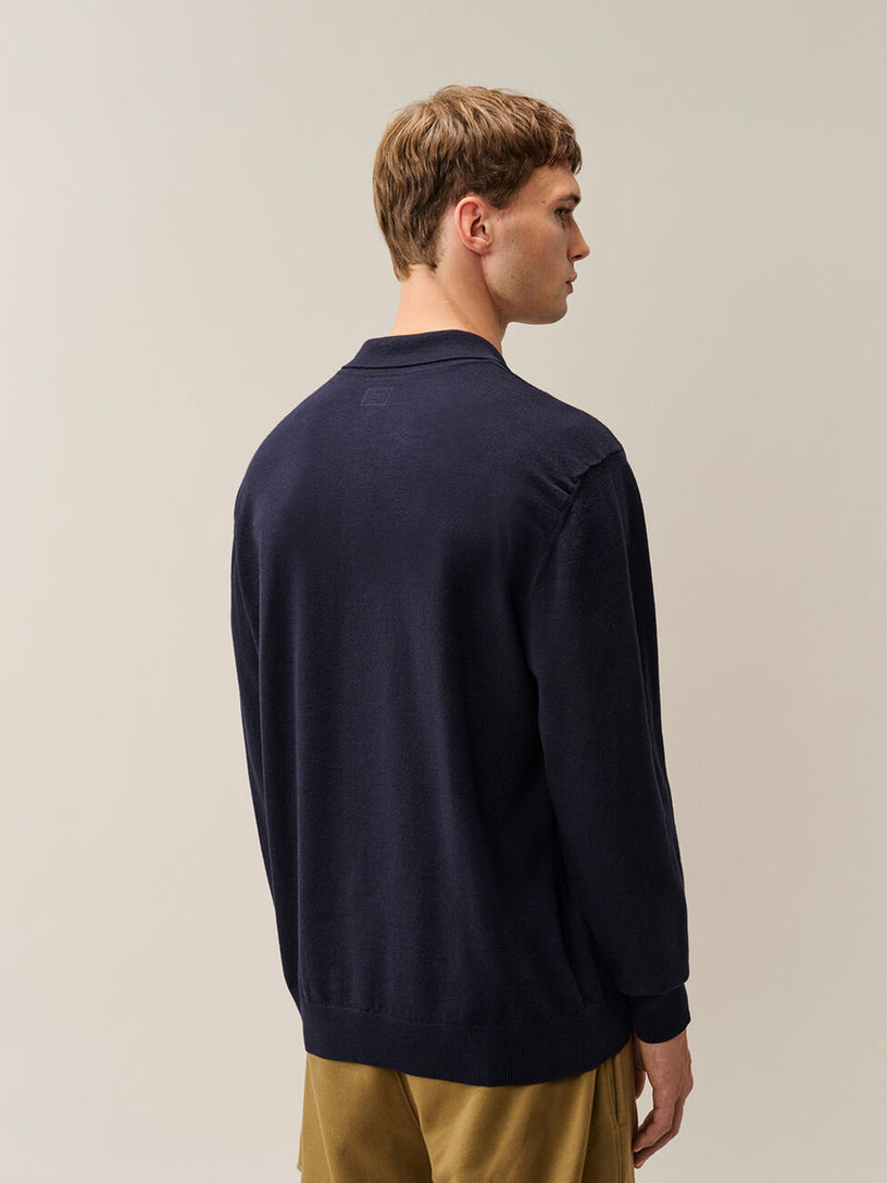 Polo in lana merino extrafine con lenti