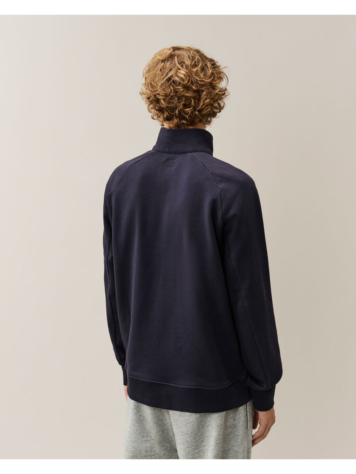 Felpa con mezza zip diagonal raised fleece lens