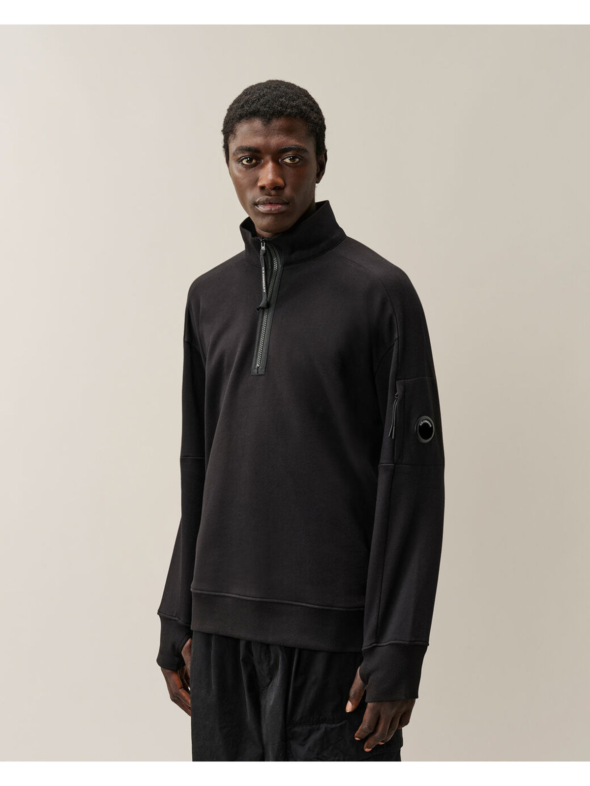 Felpa con mezza zip diagonal raised fleece lens
