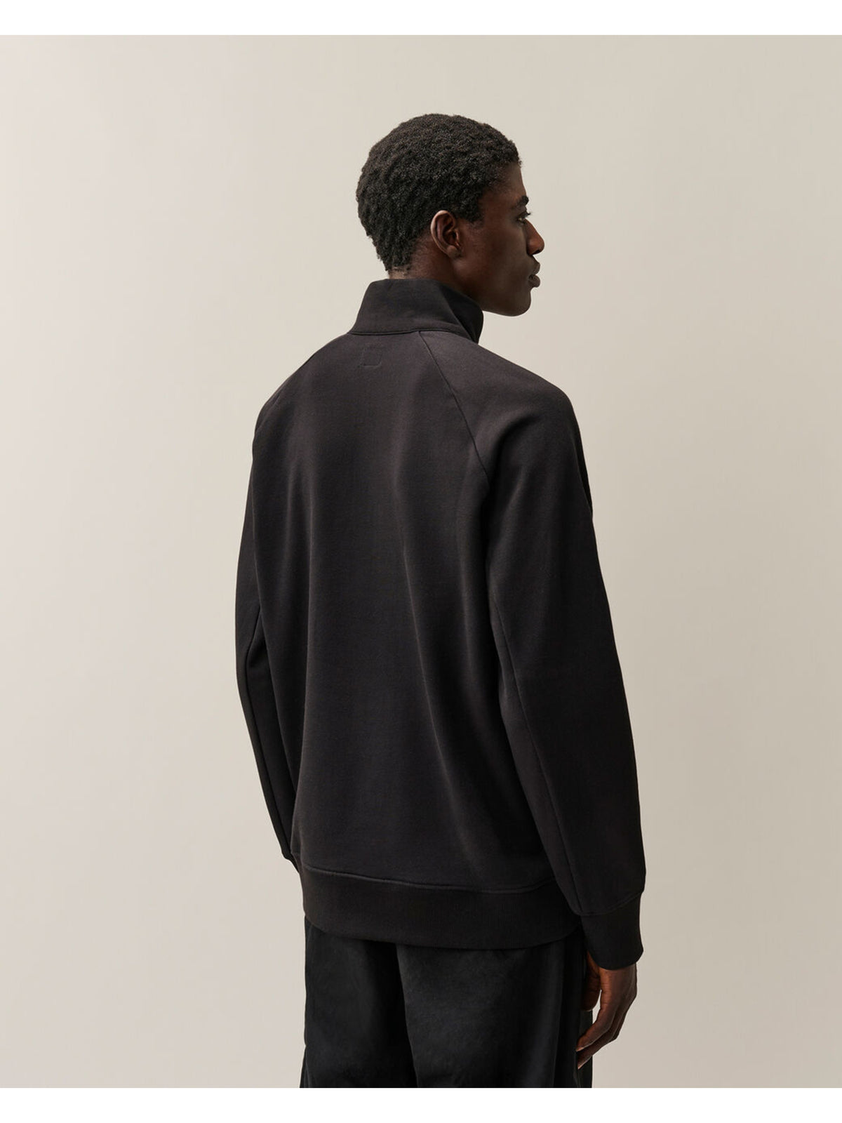 Felpa con mezza zip diagonal raised fleece lens