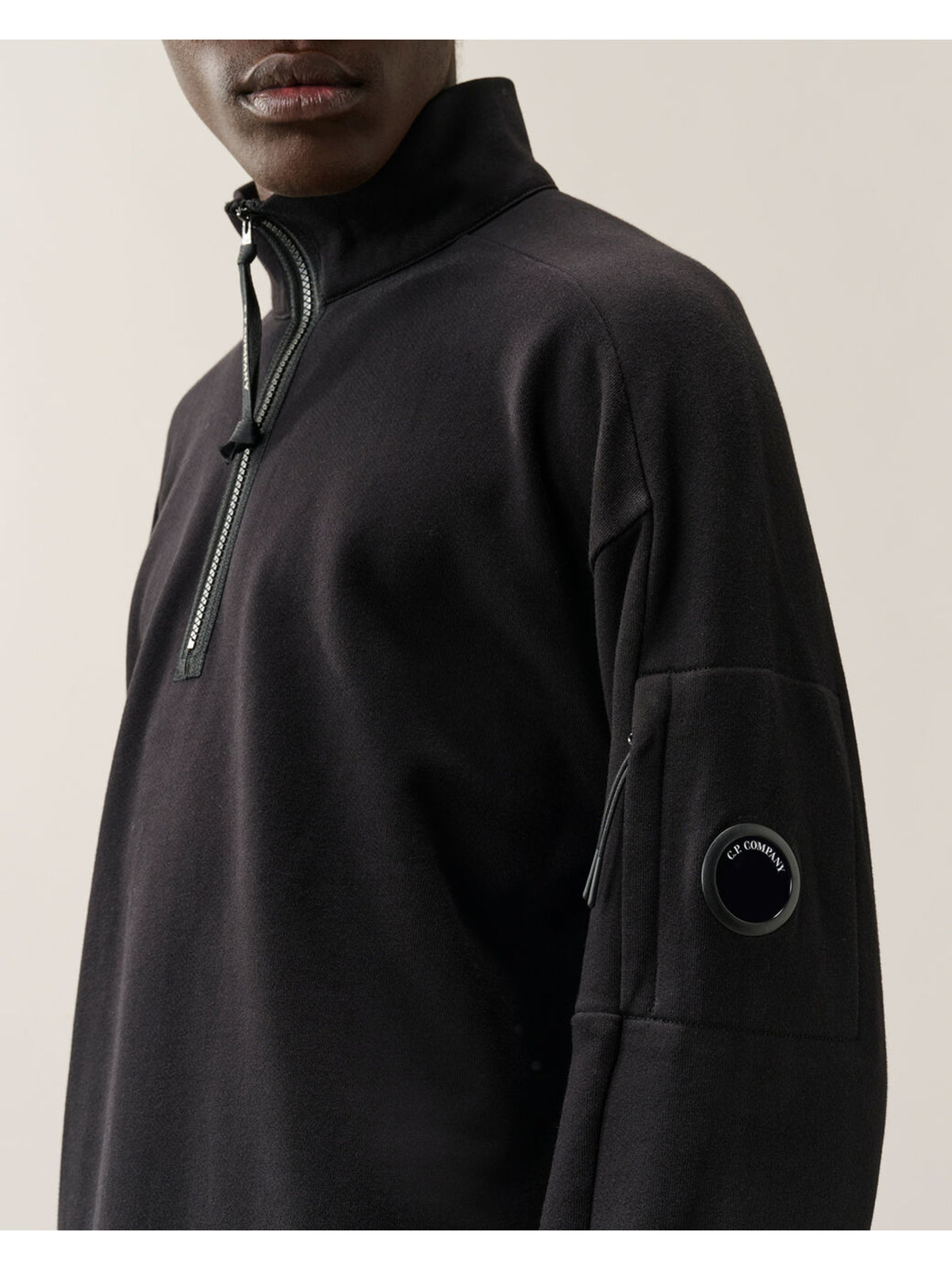 Felpa con mezza zip diagonal raised fleece lens