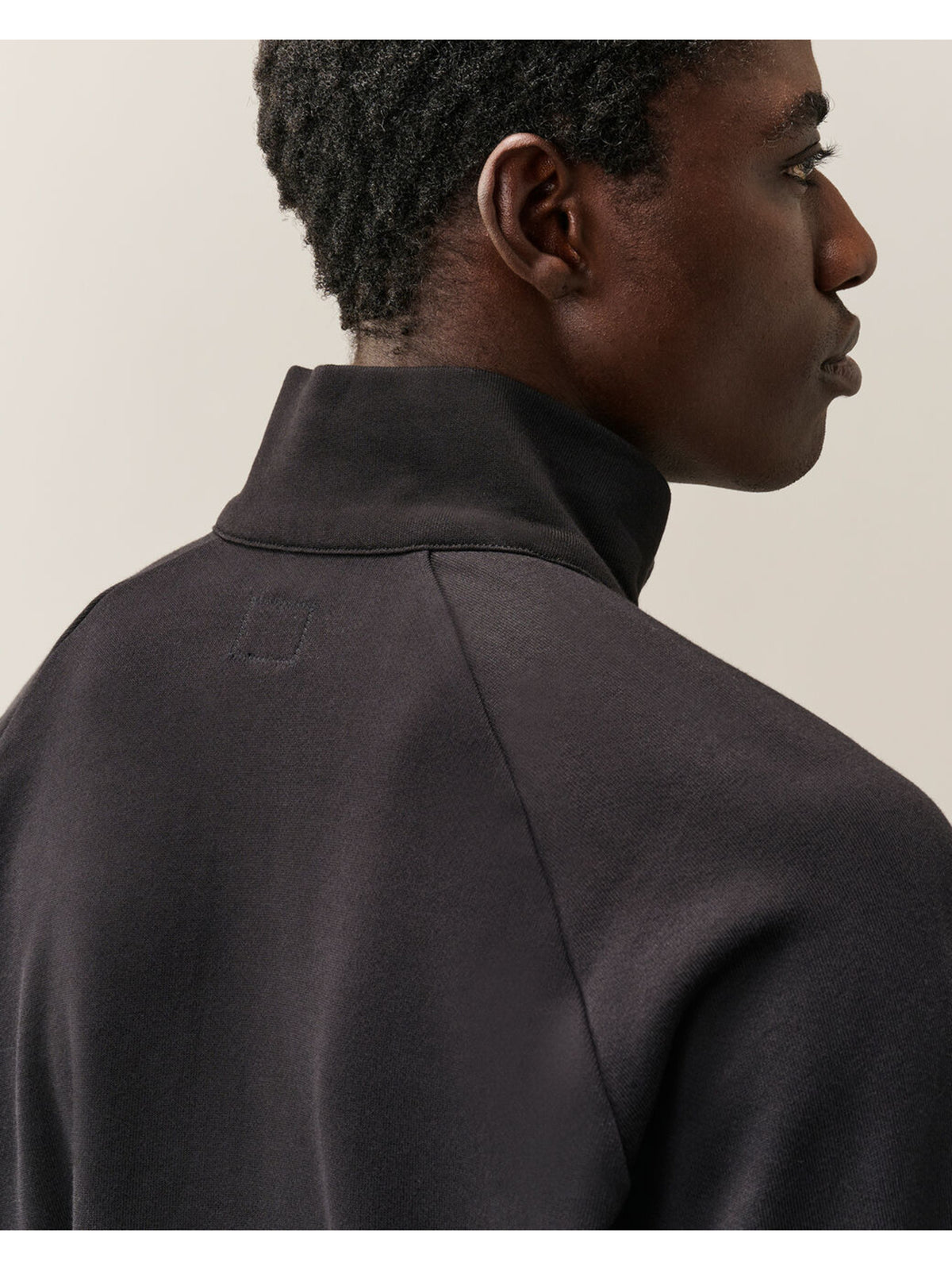 Felpa con mezza zip diagonal raised fleece lens