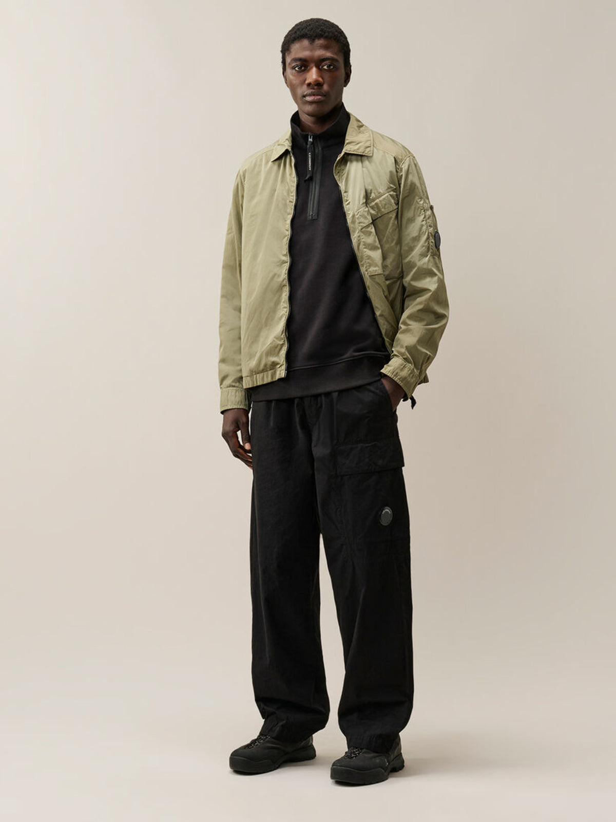 Felpa con mezza zip diagonal raised fleece lens