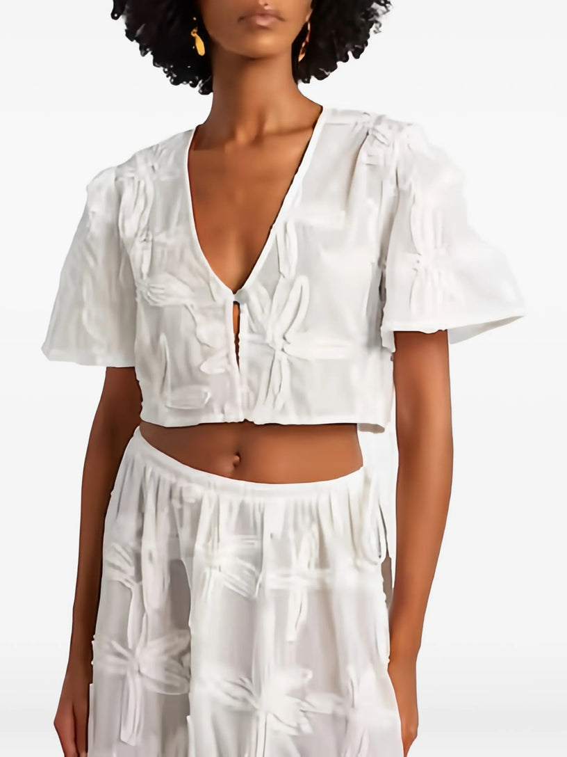 Blusa con dettagli ricamati