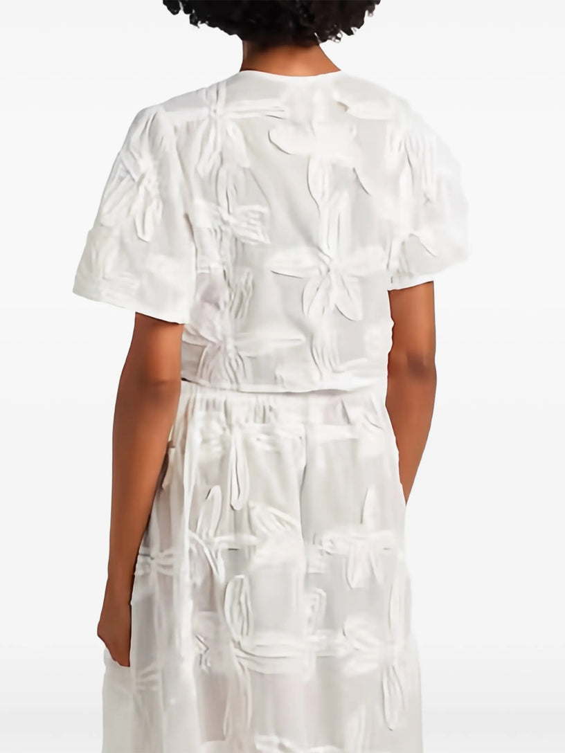 Blusa con dettagli ricamati